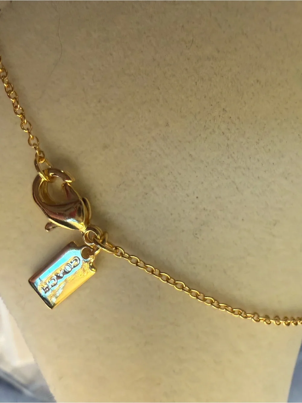 Coach Gold Bow Necklace with Multicolored Stones